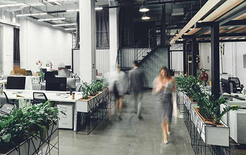 modern space with blurred people walking