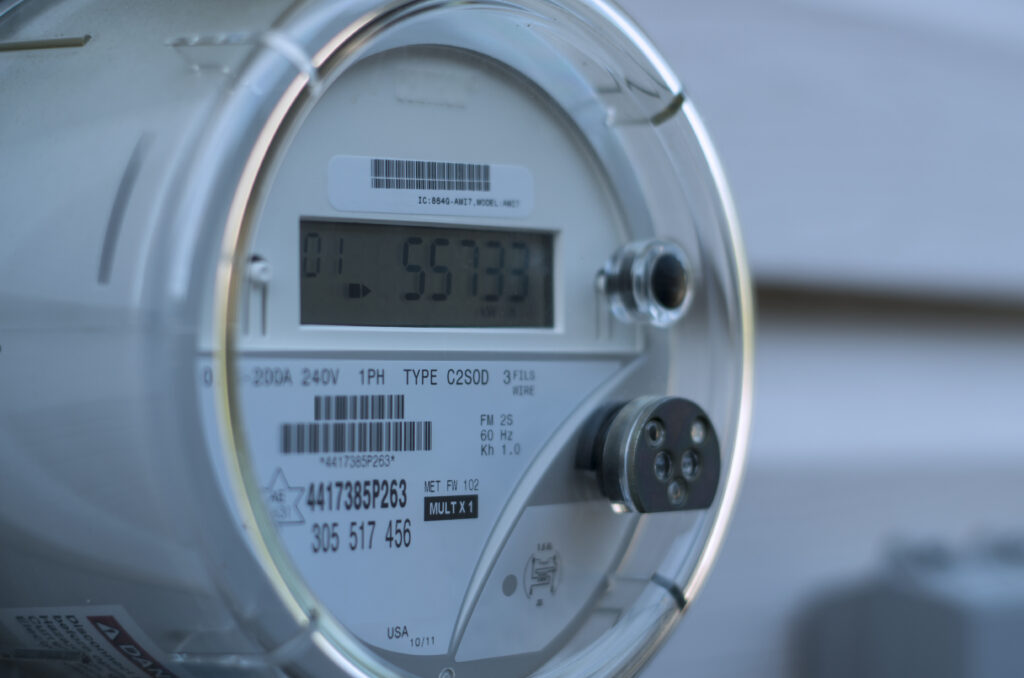 Electricity meter outside of a home being used for utility submeter reading.
