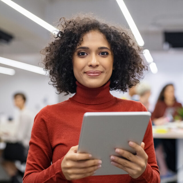 Genea Retail Security, Woman holding ipad