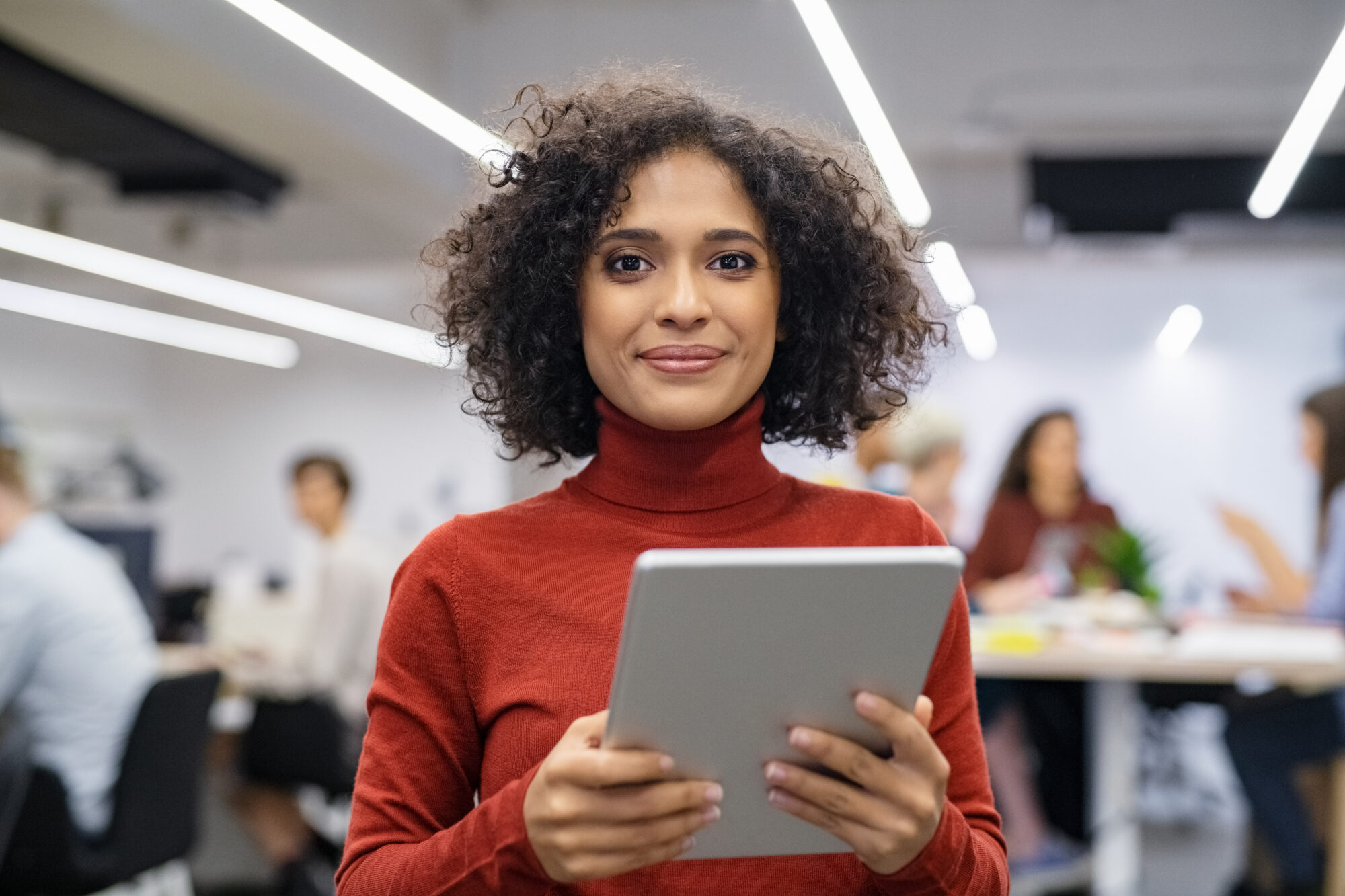 Genea Retail Security, Woman holding ipad
