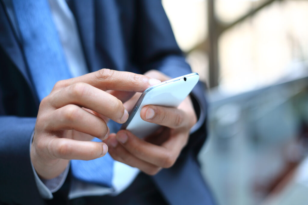 Businessman using smart phone